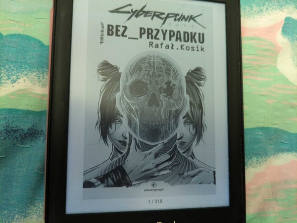 Okładka e-booka "Cyberpunk 2077: Bez przypadku" autorstwa Rafała Kosika. E-book ma 318 stron.