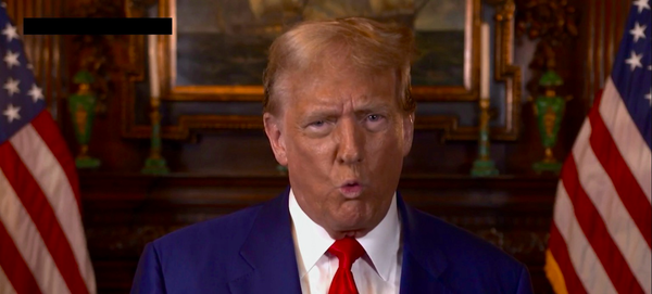 Screenshot of Trump’s non answer on abortion video in which his fake tan is outrageous to the point of the offensive blackface