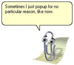 An anthropomorphized paper clip with eyes and eyebrows floating over a yellow legal pad sheet.  It says: "Sometimes | just popup for no particular reason, like now."