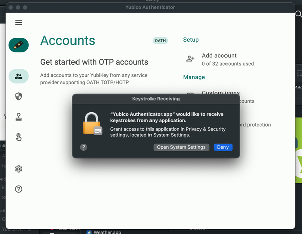 Screenshot of a computer interface with a pop-up notification for granting access to a Yubico Authenticator app for receiving all keystrokes
