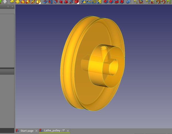 A screenshot of FreeCAD with an orange pulley model. The pulley has a semicuircular groove to receive a 5mm belt and has a shaft hole that is a 8mm diameter hole with a flat section to match the motor shaft. 