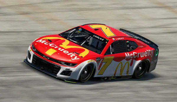 Simulated NASCAR stock car on track. McCruelty the primary sponsor, imitating the traditional McDonald's logo. Paint scheme is a white base with red paint dripping down from the top, loosely resembling blood. 