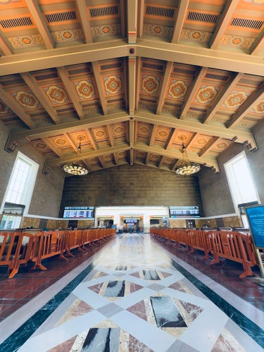 The big hall at Los Angeles Union Station. According to Wikipedia, the building combines Art Deco, Mission Revival, and Streamline Moderne style.