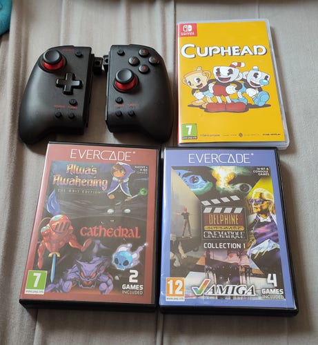 Black Hori Split Pad Pro for Switch, Cuphead for Switch, Alwa's Awakening and Cathedral for Evercade, Delphine Collection 1 for Evercade. 