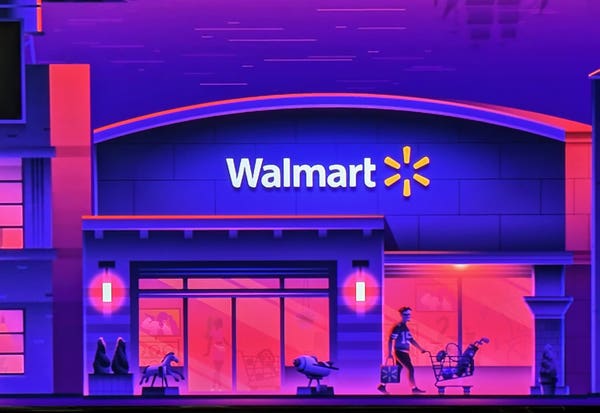 A photo of Walmart in the Roku City screensaver. There are two of those mechanical rides for small children that you put coins in, and a person walking out of the Walmart carrying a Walmart bag.