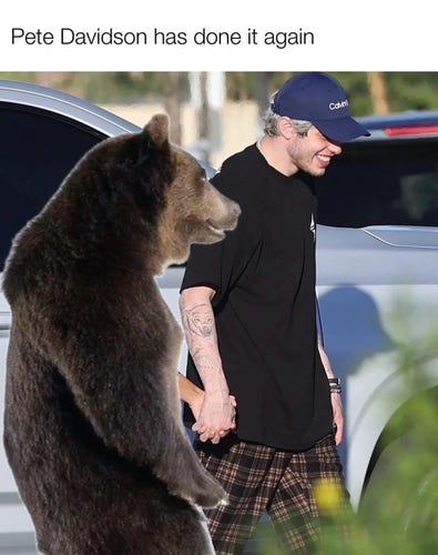 Pete Davidson has done it again [photo of Pete Davidson walking hand in hand happily with a bear]