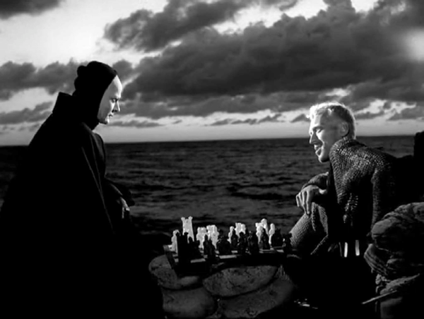 Ingmar Bergman death, a movie scene where a man is playing chess with death itself.