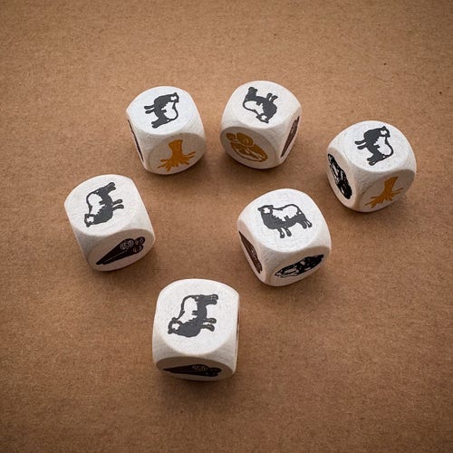 Six white dice with sheep icons on a brown background.