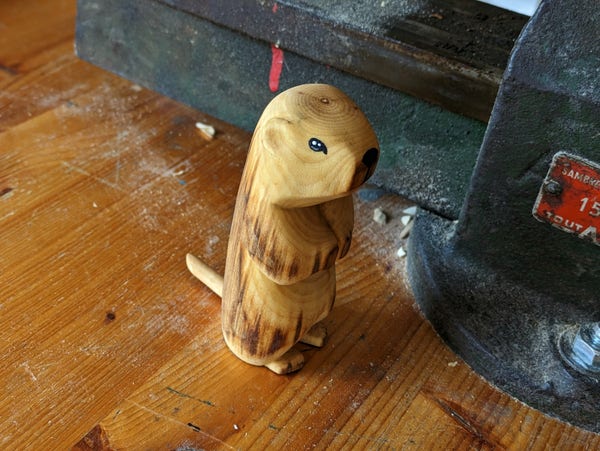Woodcarved standing marmot