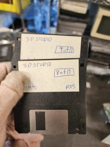 Two 3.5" floppy disks, labeled in handwritten pen: "3D Studio". One is labeled 9 of 11 and the other is 8 of 11
The top one has a date of 7/19/96 is in the corner. 