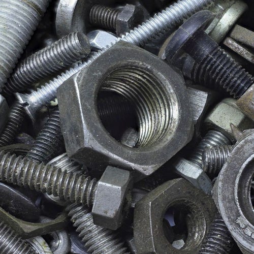 A close-up image of a pile of nuts and bolts of various sizes and lengths.