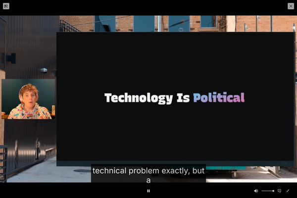 Miriam showing a slide with the text “Technology is political”