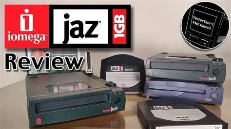 An array of Iomega Jaz drives and 1 GB cartridges, accompanied by the text "Review" on the screen.