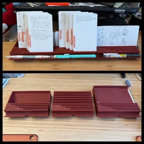 a split image. in the top half you see 3 card holder things with pens in the front, and many angled slots for note cards with checklists on them & highlighted titles on the side

in the bottom you see the same card holders separated, & without cards or pens. 

They're made of a sparkly red plastic.