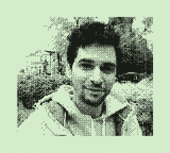 Selfie of a dude in a hoodie, looking at the camera, outside, highly pixelated