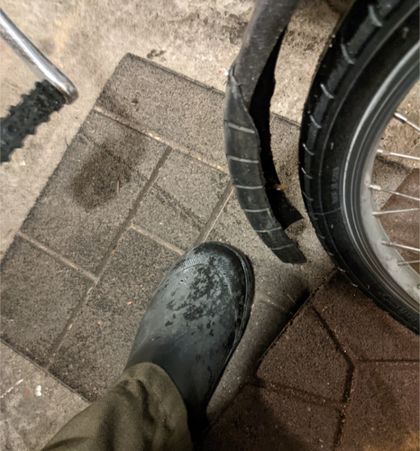Shoes not very wet, mudflap made of old 20x2.3 tire, wet new front tire (1.5in, not my favorite, getting something bigger than 2.0 needs a new fork, maybe suspension)