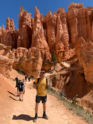 Scott hiking in Bryce Canyon. Hoodoo spires in background