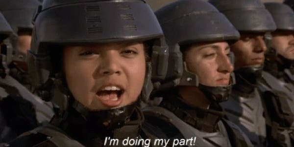 A screenshot from the movie Starship Troopers and the infamous soldier “I'm doing my part!” meme 