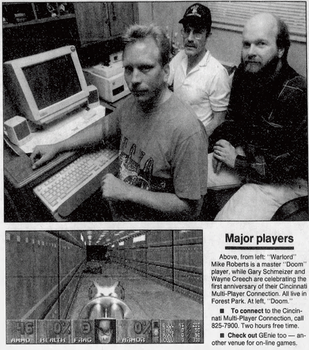 Three men — Mike Roberts, Gary Schmeizer, and Wayne Creech — sit beside a computer running the Cincinnati Multi-Player Connection BBS.