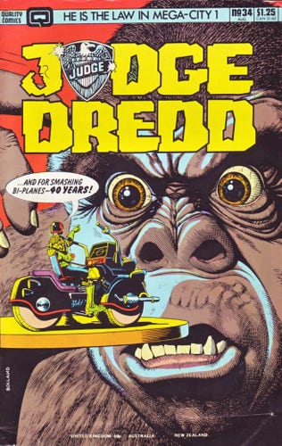 The front cover of Judge Dredd No 34 (1st Series) from August 1986, featuring cover art by Brian Bolland showing Dredd sentencing King Krong to 40 years for smashing bi-planes. Inside is the classic Judge Dredd story The Executioner.