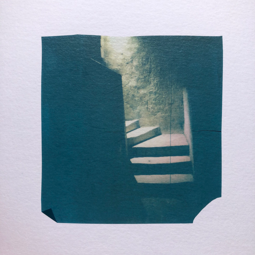 A stone staircase lit by a spotlight. Polaroid emulsion lift.
