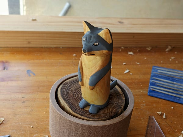 Woodcarved standing wolf