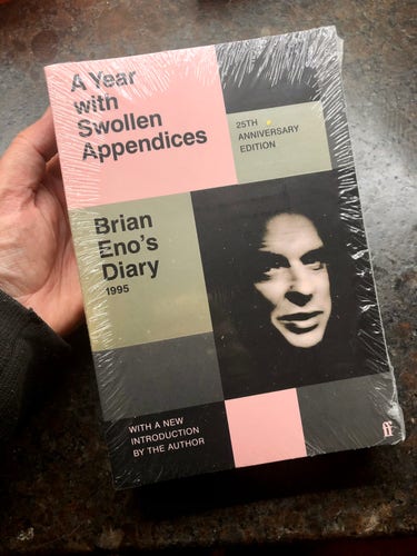 Cover of a paperback book, A Year with Swollen Appendices. Brian Eno’s Diary, with a new forward by the author. 25th Anniversary Edition.