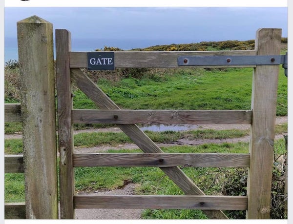 Photo: a gate on a coastal path, helpfully labelled ‘gate’