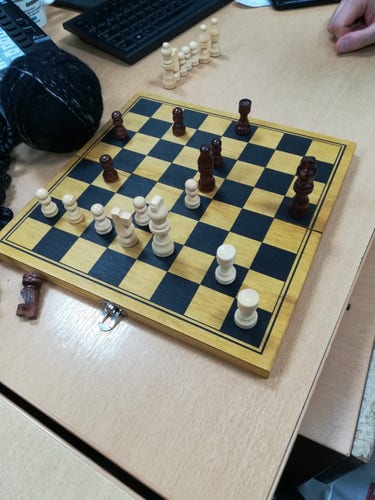 A finished game of chess with white winning.