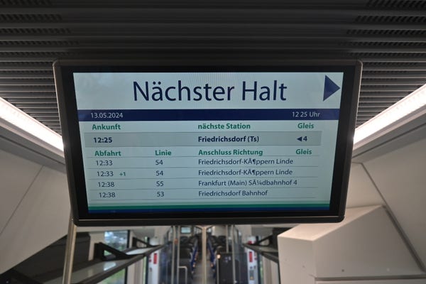An in-train information screen showing UTF-8 encoded umlauts in ISO-8859-1