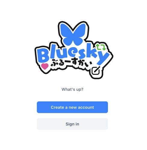 Bluesky's login page with a cute version of the logo. It has a blue butterly, "Bluesky" in a fun font, the like button and repost button, and Japanese characters under it.