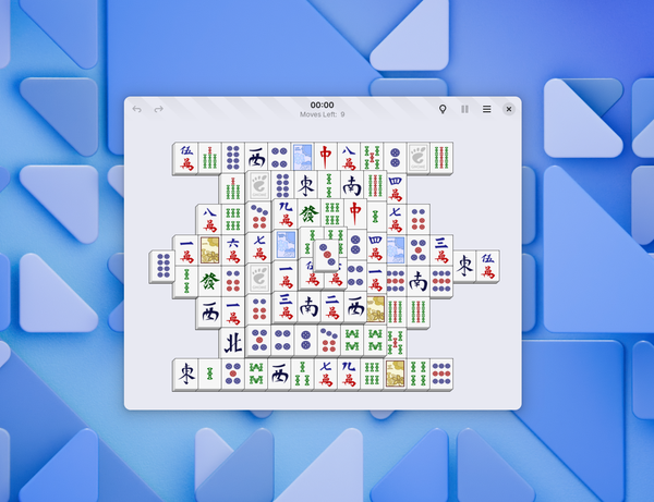 Screenshot of the GNOME Mahjongg window. It's a light blue window with no headerbar separator. There are a few buttons in the headerbar, and the game pieces in the content area.
