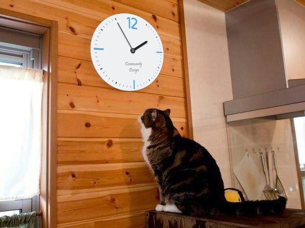 A cat looking at the time. The clock use the design of plasma analog clock widget 