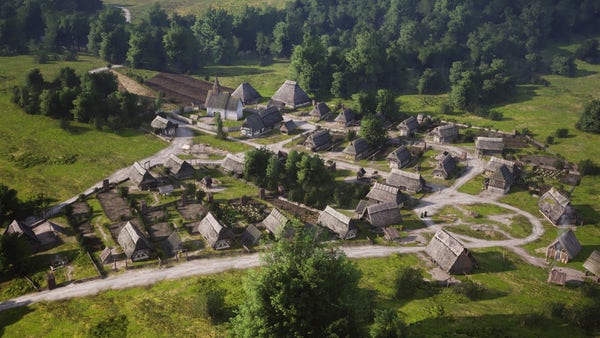 Aerial view of a rustic village with thatched-roof houses and dirt roads amidst greenery.