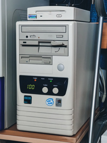 A picture of older PC. This machine has all the essential drives/storage and even comes with a turbo button for those older games or apps. The name "turbo" was misleading, as it didn't actually boost performance. Turbo "Off" means slowing down the CPU's clock speed, often down to the speeds of older processors. 