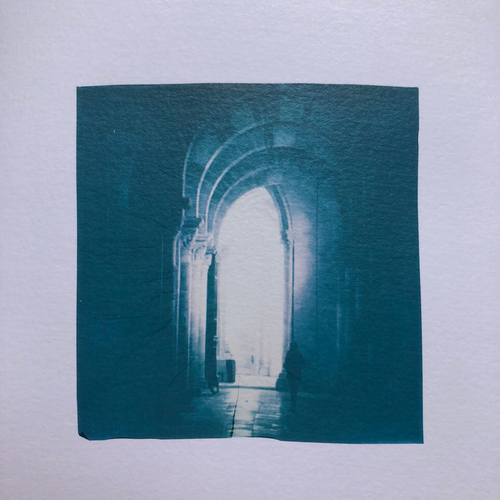 Inside a basilica. Dark silhouette silhouette of a pilgrim walking toward the lights of the church, under The Pillars of the Earth… Polaroid emulsion lift.