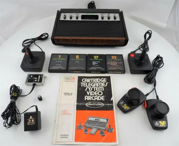 1970s video game console with two wired joysticks.