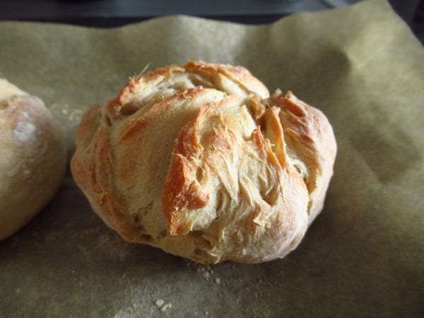 A rustic-looking breakfast bun.