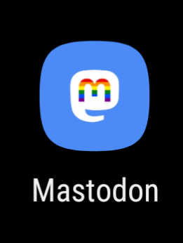 The Mastodon app logo as it is seen on my android phone, but with the M in rainbow flag colors.