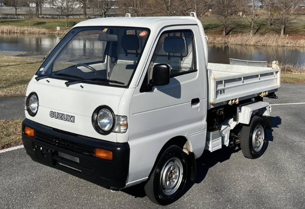 Very small suzuki truck. 