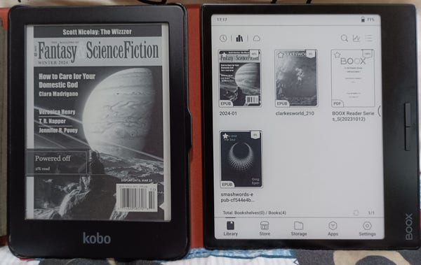 Two E Ink eReaders next to each other. On the left is the Kobo Clara HD, on the right is the Onxy BOOX Page. The Clara HD is displaying the cover of the magazine, "The Magazine of Fantasy & Science FIction", while the BOOX Page is displaying a shelf of eBooks.