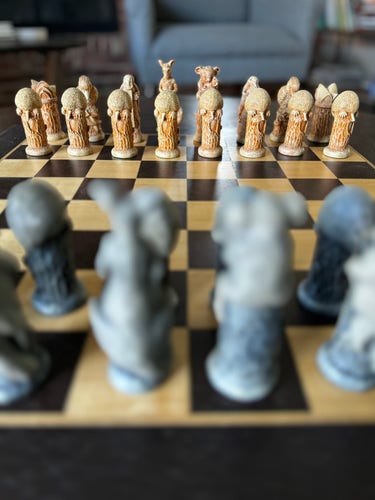 chess board with various aussie animals as the pieces on the board