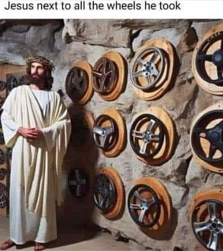 Jesus is showing off the wall of a cave, with mount-plaques filled with different automobile steering wheels.  
CAPTION: Jesus next to all the wheels he took