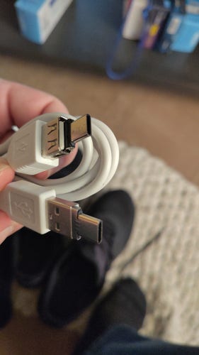A USB-A extension cable with USB-C adapters jammed into both ends.