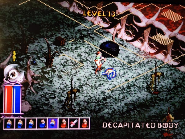 Level 13 of the Diablo dungeons, Alathra the rogue and a decapitated body next to her. Lots of decapitated bodies down here. 