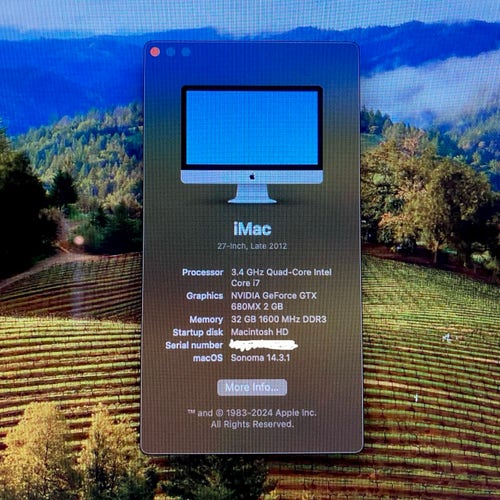 An iMac computer's 'About This Mac' window displaying specifications on a screen.