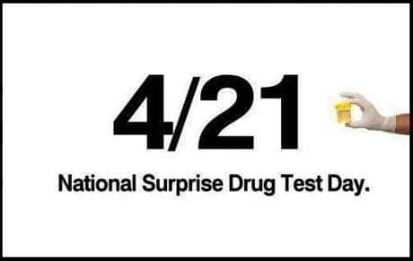 Sign reads, "4/21, national surprise drug test day"