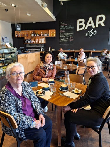 3 women sitting at a brunch table at an Italian deli in Adelaide 