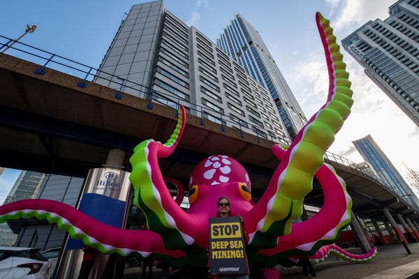 Photo: A multi coloured octopus used as part of a Greenpeace demonstration