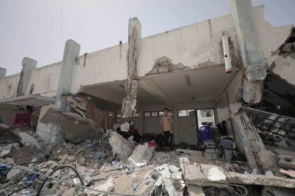 Displaced Palestinians from Rafah seeking shelter in ruins of what used to be UNRWA shelter.